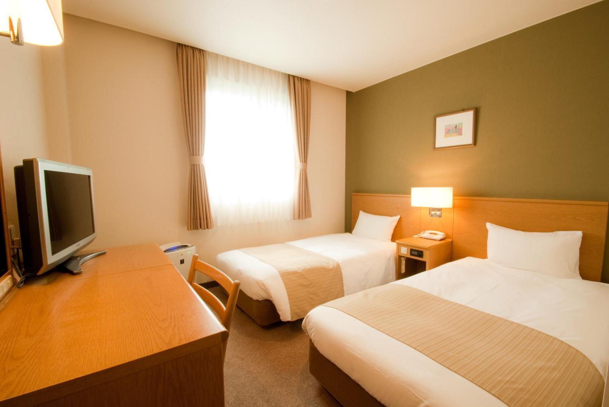Hotel Folkloro Takahata Habitación foto